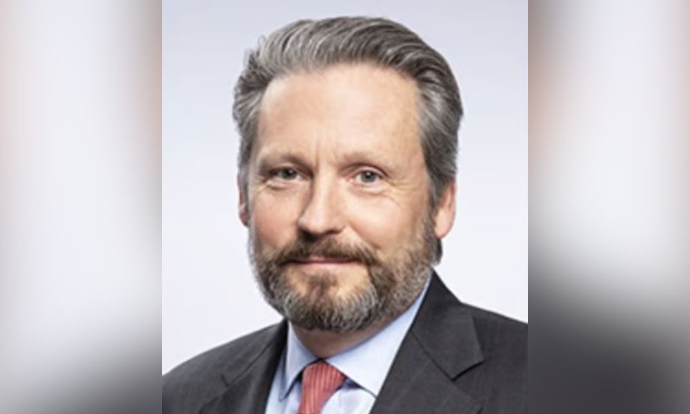 Crawford appoints W. Bruce Swain CEO